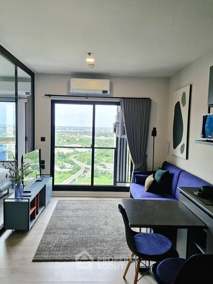 Modern living room with stunning city view and stylish decor