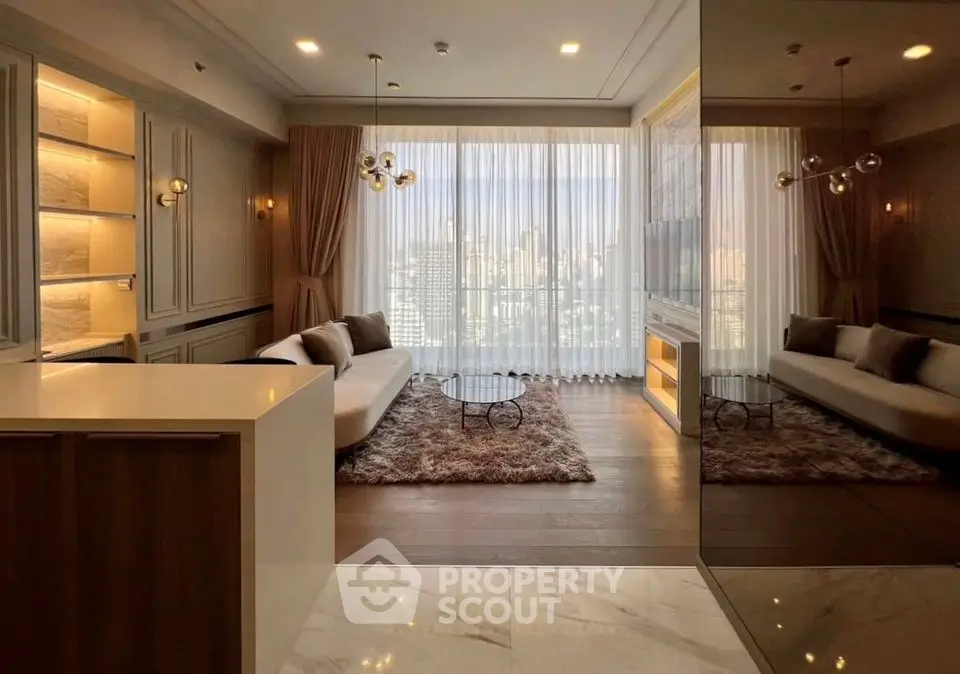 Luxurious living room with city view, elegant decor, and plush furnishings in a high-rise apartment.