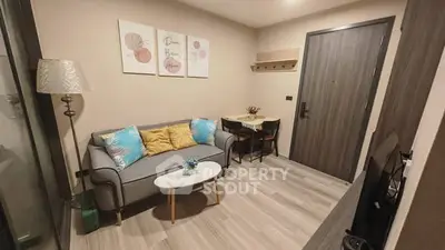 Cozy living room with modern decor and stylish furniture in a contemporary apartment.