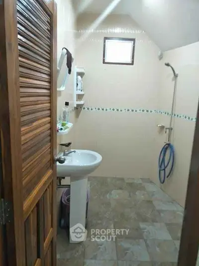 Cozy bathroom with modern fixtures and natural light