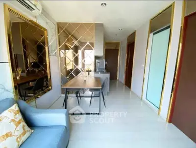 Modern living room with elegant dining area and stylish decor in a contemporary apartment.