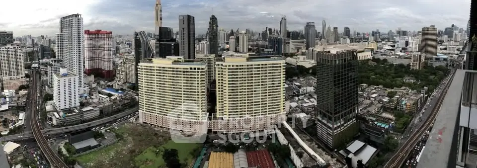 Panoramic cityscape view showcasing high-rise buildings and urban skyline.