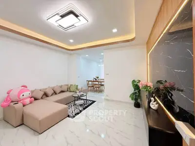 Modern living room with stylish lighting and cozy seating area