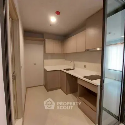 Modern kitchen with sleek cabinets and minimalist design