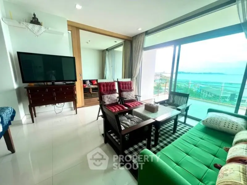 Modern living room with ocean view and stylish furniture