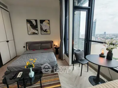 Modern bedroom with stunning city view and stylish decor