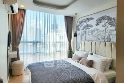 Luxurious bedroom with elegant decor and large window offering city views