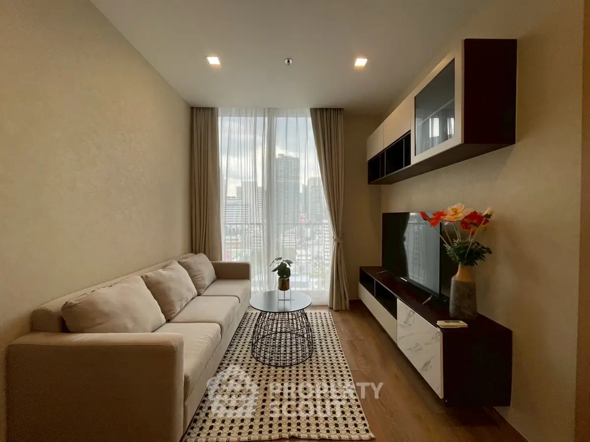 Modern living room with city view, cozy sofa, and stylish decor