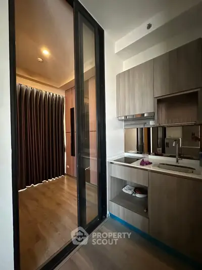 Modern kitchen with sleek cabinetry and open layout design