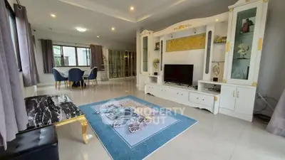 Spacious living room with elegant decor and modern furnishings