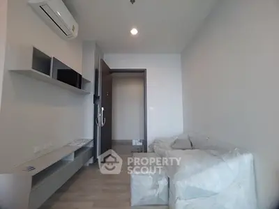 Modern living room with air conditioning and minimalist furniture