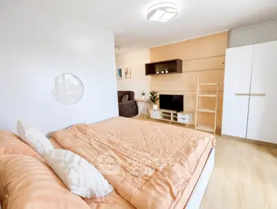 Modern bedroom with cozy decor and stylish furnishings