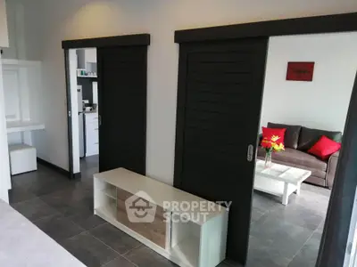 Modern living room with sliding doors and stylish decor