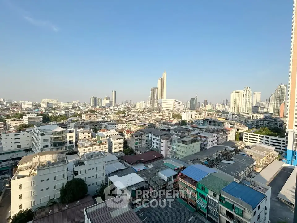 Stunning cityscape view from high-rise building showcasing urban skyline and vibrant architecture.