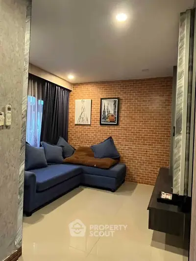 Cozy living room with modern decor and comfortable seating