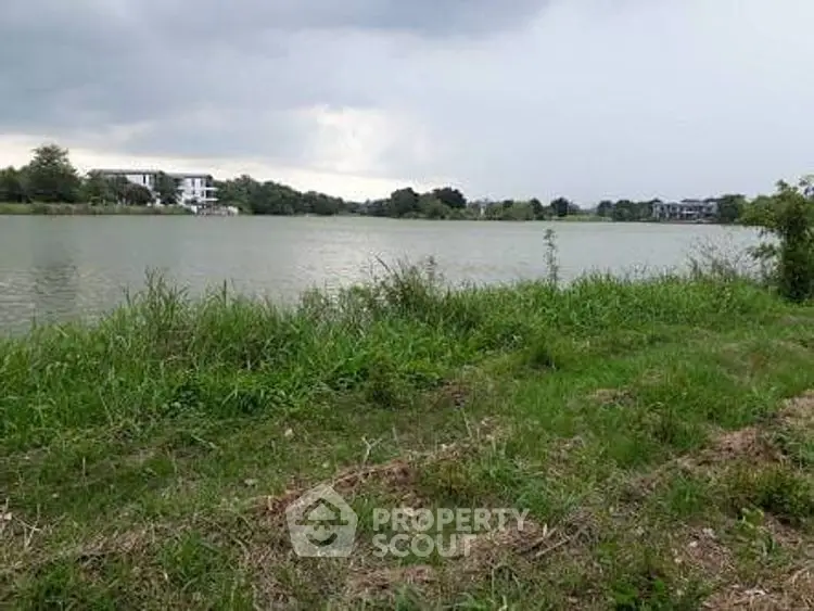 Scenic waterfront property with lush greenery and serene views, ideal for tranquil living.