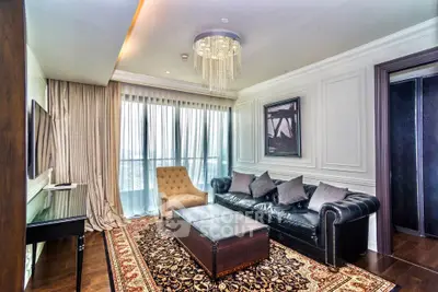 Luxurious living room with elegant chandelier and classic decor