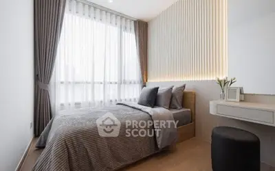 Modern bedroom with stylish decor and natural light