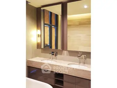 Luxurious modern bathroom with dual sinks and elegant lighting