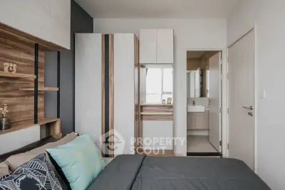 Modern bedroom with ensuite bathroom and stylish wooden accents