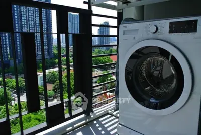 Modern balcony with washing machine and cityscape view
