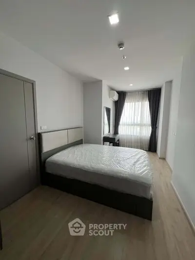 Modern bedroom with minimalist design and natural light