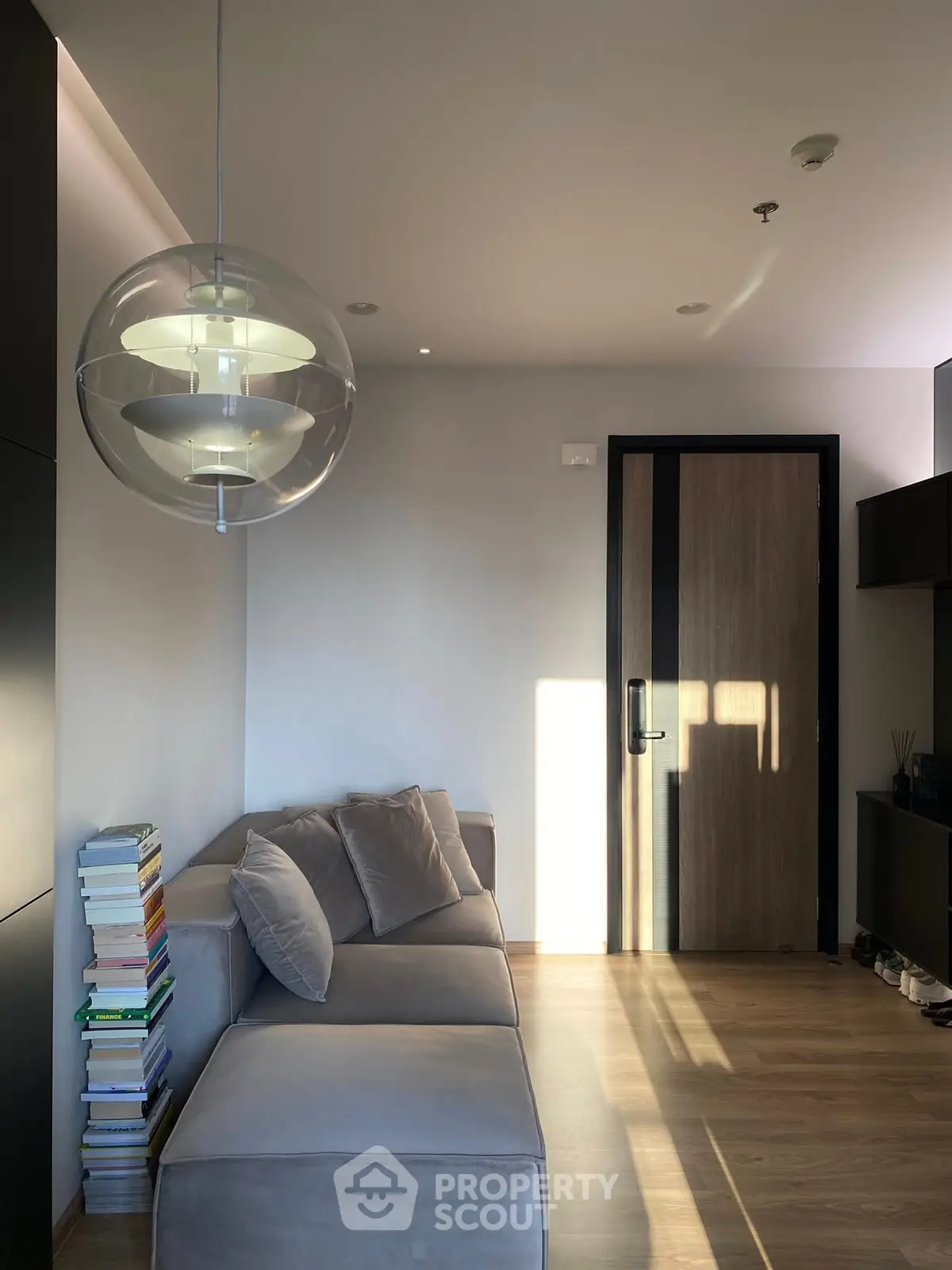 Modern living room with stylish lighting and cozy seating area