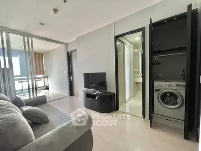Modern living room with washing machine and sleek interior design