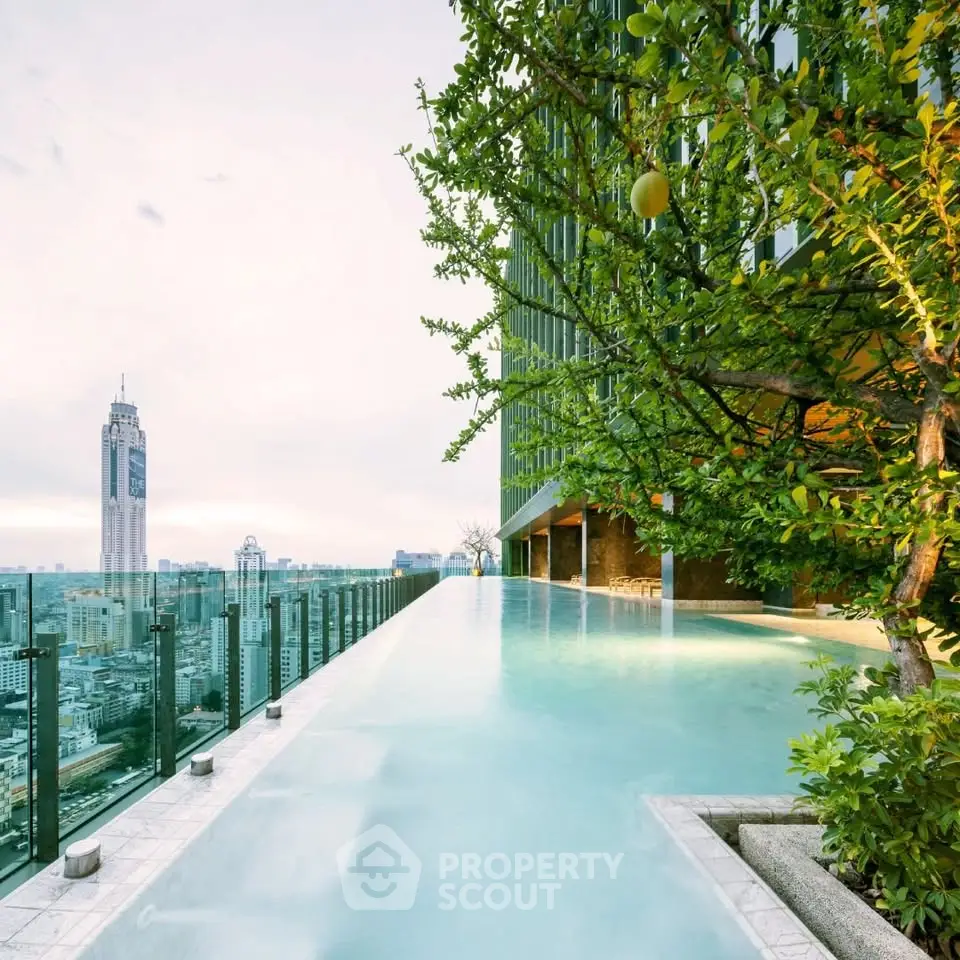 Luxurious rooftop infinity pool with stunning city skyline view