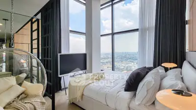 Luxurious bedroom with panoramic city view and modern decor