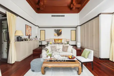 Luxurious living room with high ceilings and elegant decor