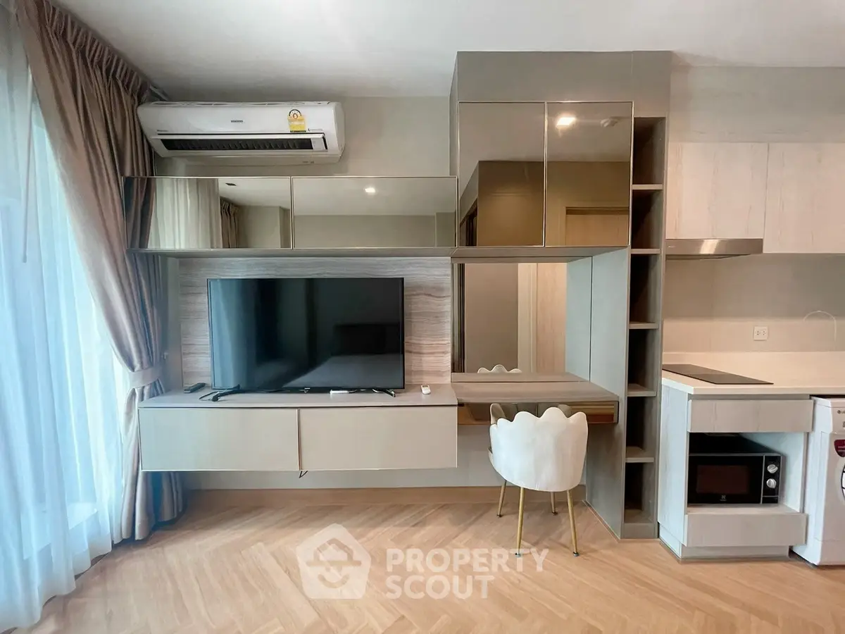 Modern living room with built-in TV unit and stylish decor