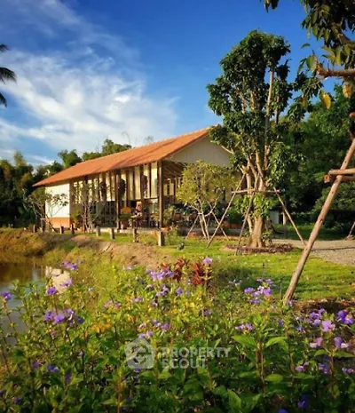 Charming countryside home with lush garden and serene pond view