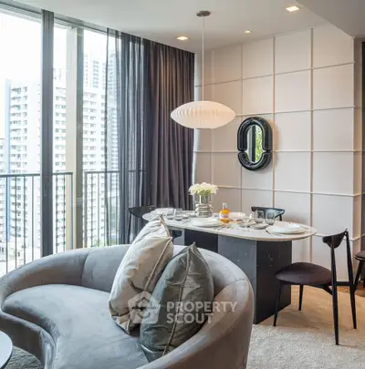 Modern living room with stylish furniture and city view from large windows