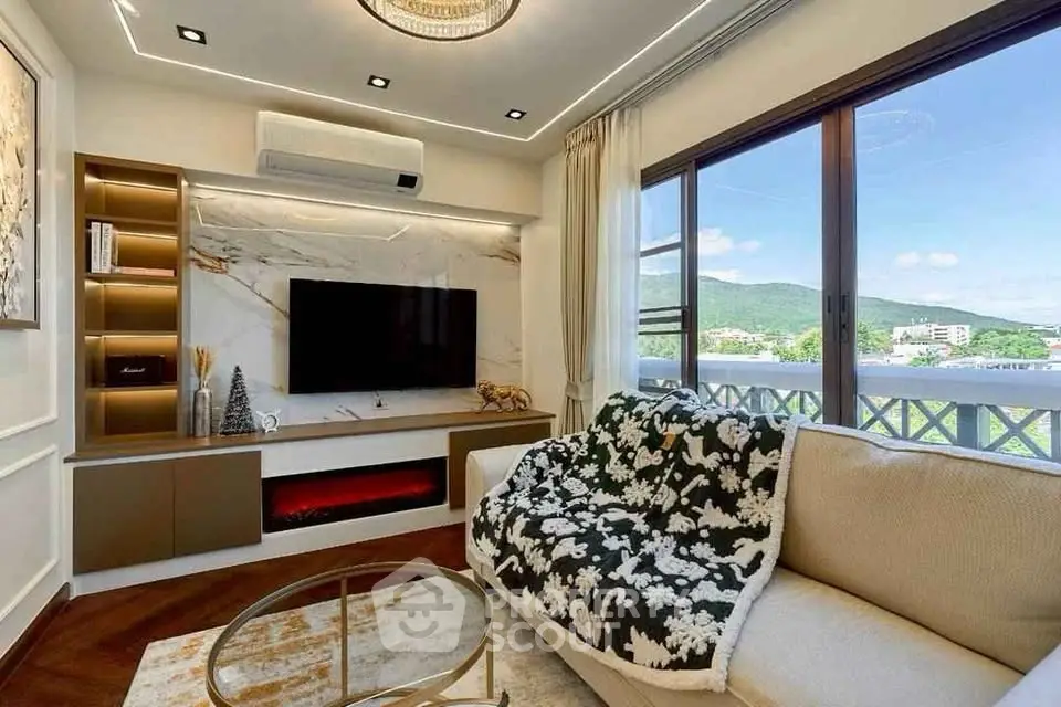 Luxurious living room with modern decor and stunning mountain view through large window.