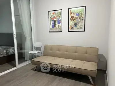 Modern living room with sleek sofa and artistic wall decor