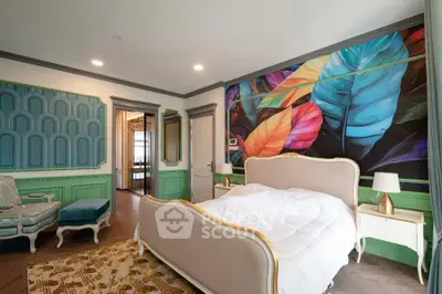 Luxurious bedroom with vibrant leaf mural and elegant furniture, perfect for stylish living.