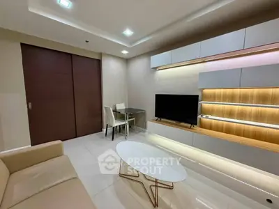 Modern living room with sleek furniture and built-in shelving