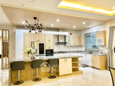Luxurious modern kitchen with marble countertops and stylish lighting