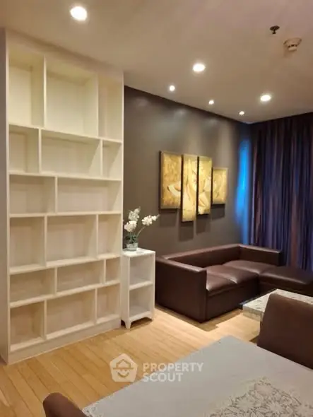 Modern living room with elegant lighting and stylish furniture