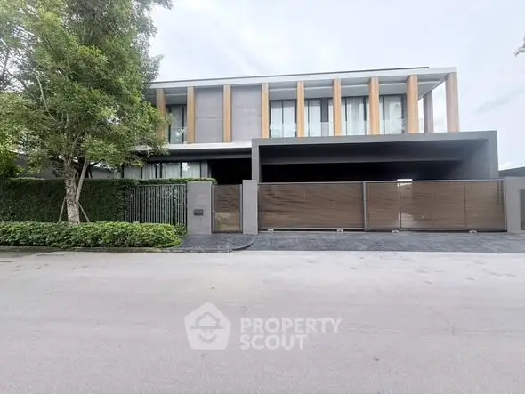 Modern luxury house exterior with sleek design and spacious driveway