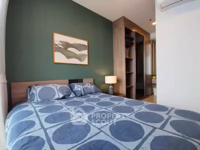 Modern bedroom with stylish decor and built-in closet