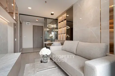 Luxurious modern living room with elegant decor and plush sofa in a high-end apartment.
