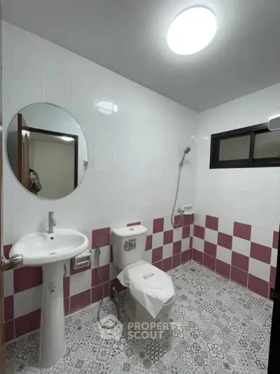 Modern bathroom with stylish tile design and sleek fixtures