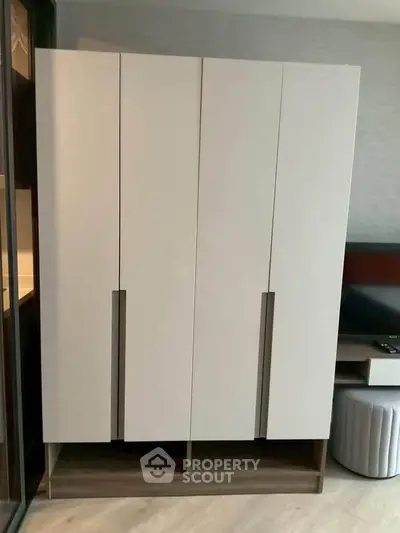 Modern minimalist wardrobe in a stylish bedroom setting