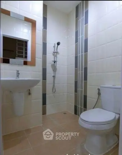 Modern bathroom with sleek shower and stylish tiles