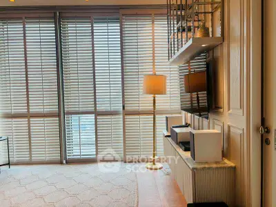 Luxurious living room with floor-to-ceiling windows and elegant decor