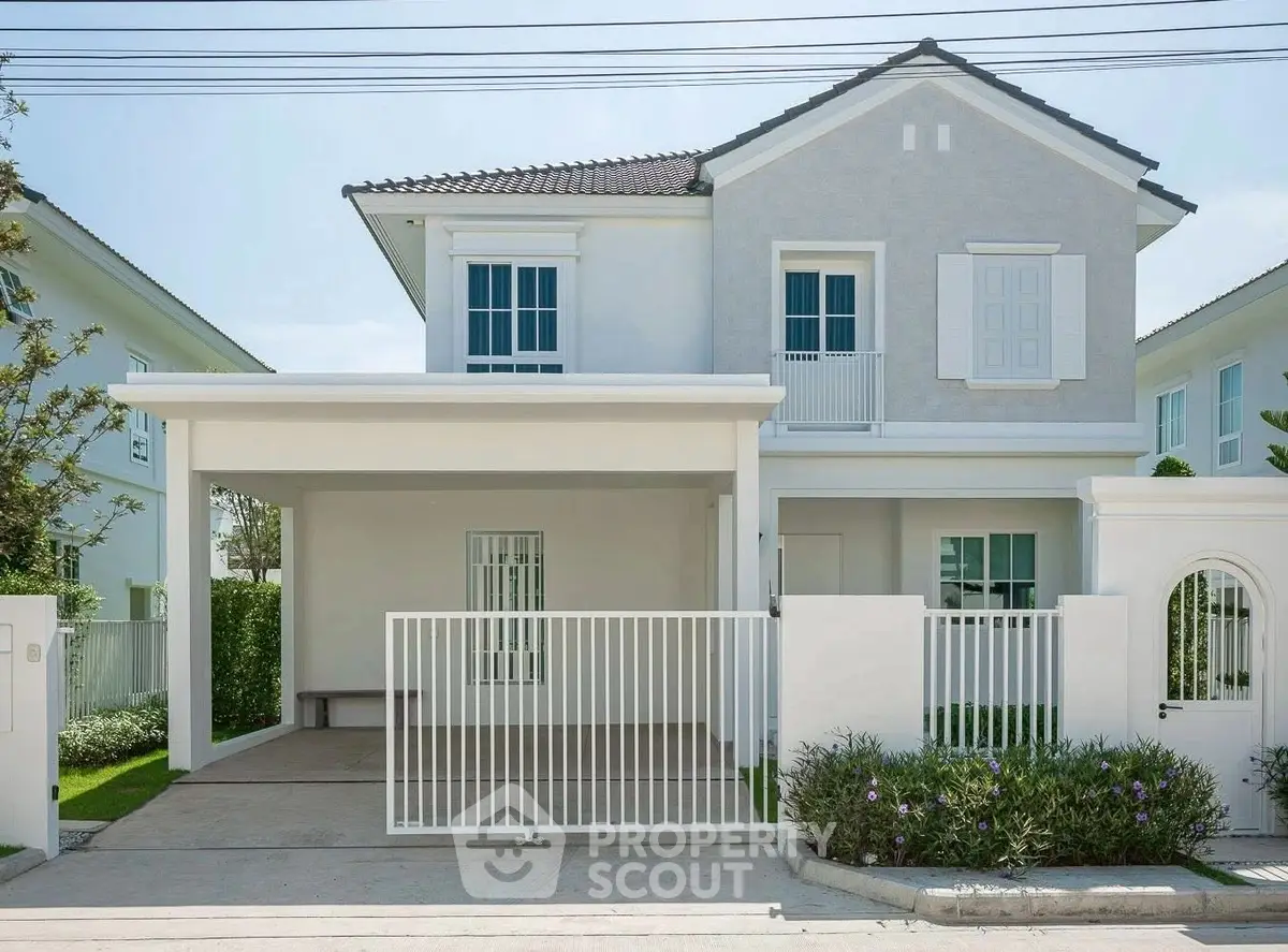 Charming two-story house with modern design and spacious driveway