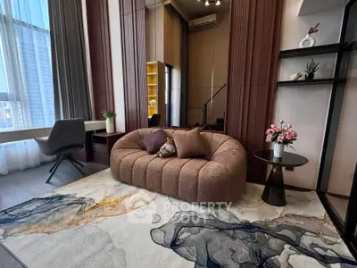 Luxurious modern living room with stylish sofa and elegant decor in high-rise apartment.