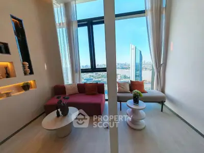 Modern living room with panoramic city view and stylish furniture